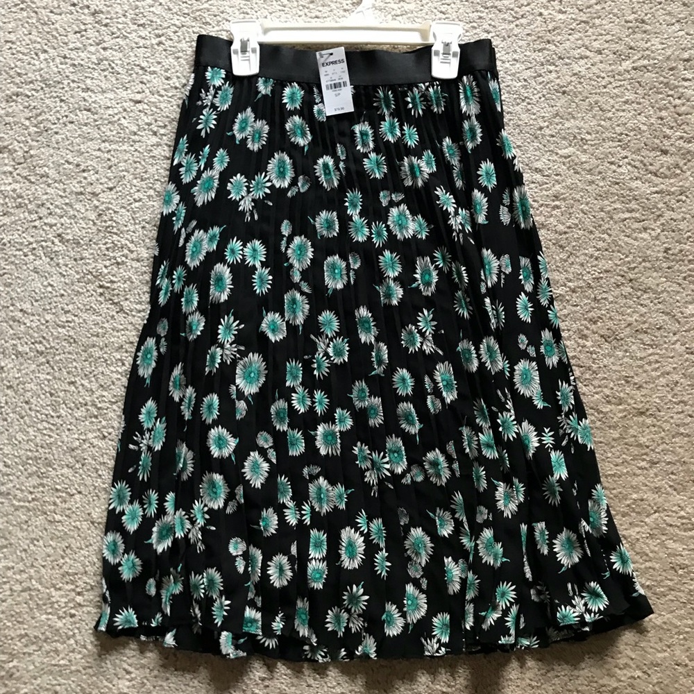 Women’s black floral print skirt.